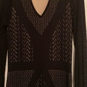 Used Black sweater dress with cream underlining.